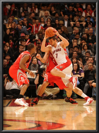 Houston Rockets V Toronto Raptors: Andrea Bargnani And Luis Scola by Ron Turenne Pricing Limited Edition Print image