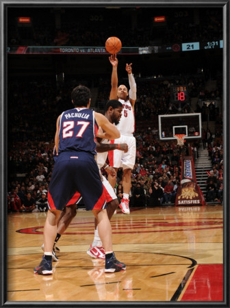 Atlanta Hawks V Toronto Raptors: Jerryd Bayless And Zaza Pachulia by Ron Turenne Pricing Limited Edition Print image