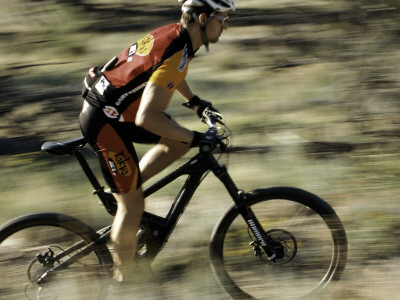 Close Up Of Fast Moving Mountain Biker, Mt. Bike by Michael Brown Pricing Limited Edition Print image