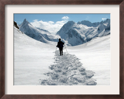 A Lone Mountain Hiker Walks In The Snow, Formazza Valley, Northern Italy by Fabio Polimeni Pricing Limited Edition Print image