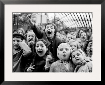 Wide Range Of Facial Expressions On Children At Puppet Show The Moment The Dragon Is Slain by Alfred Eisenstaedt Pricing Limited Edition Print image