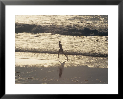 Boy Running On Beach, Venice Beach, Ca by Harvey Schwartz Pricing Limited Edition Print image