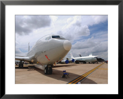 E-8C Joint Surveillance Target Attack Radar System And A Rc-135V/W Rivet Joint Aircraft by Stocktrek Images Pricing Limited Edition Print image