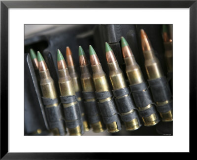 Belted Bullets For An M-249 Squad Automatic Weapon by Stocktrek Images Pricing Limited Edition Print image