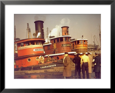 Men At Pier Looking At 3 Tugboats, One Named Courageous With Crewmen On Deck by Andreas Feininger Pricing Limited Edition Print image