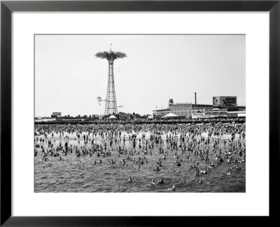 Bathers Enjoying Coney Island Beaches. Parachute Ride And Steeplechase Park Visible In The Rear by Margaret Bourke-White Pricing Limited Edition Print image