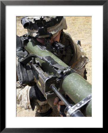 A Marine Using The Shoulder-Launched Multi-Purpose Assault Weapon by Stocktrek Images Pricing Limited Edition Print image