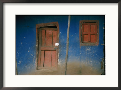 Faded Blue And Red Paint Cover The Entrance To A Dwelling In Addis Ababa by Jodi Cobb Pricing Limited Edition Print image