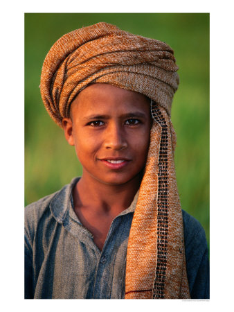 Boy With Orange Turban, Looking At Camera, Afghanistan by Stephane Victor Pricing Limited Edition Print image