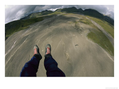 Motorized Paraglider Over A Broad Outwash Plain Between Volcanoes Near Klyuchevskoy by Peter Carsten Pricing Limited Edition Print image