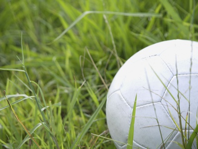 Abandoned Soccer Ball In Grass by Aflo Pricing Limited Edition Print image