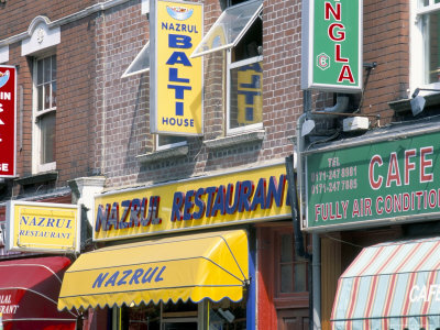 Indian Restaurants, Brick Lane, Spitalfields, London, England, United Kingdom by Brigitte Bott Pricing Limited Edition Print image