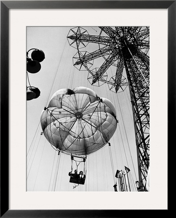 Couple Taking A Ride On The 300 Ft. Parachute Jump At Coney Island Amusement Park by Marie Hansen Pricing Limited Edition Print image