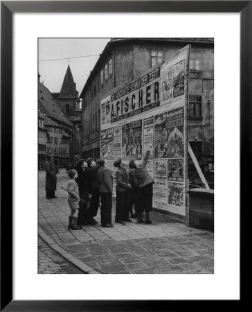 Boys Examining Circus Posters by Carl Mydans Pricing Limited Edition Print image