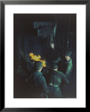 Workers Forging Molten Metal With 16,000 Lb Drop Forging Hammer At Wyman-Gordon Co by Andreas Feininger Pricing Limited Edition Print image