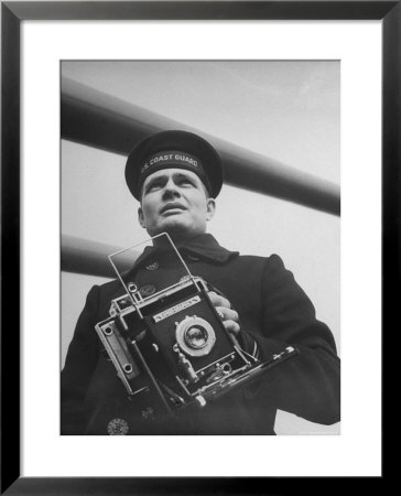 Navy Soldier Holding Camera by George Strock Pricing Limited Edition Print image