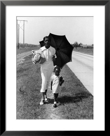 African American Woman Walking Daughter To Sunday School On Road Between Memphis Tn Clarksdale, Ms by Alfred Eisenstaedt Pricing Limited Edition Print image