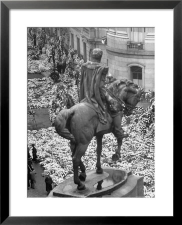 Funeral Wreaths For Evita Peron Cover Street Beneath Statue Of Julio Argentino Roca by Alfred Eisenstaedt Pricing Limited Edition Print image