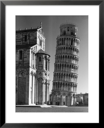 Famed Leaning Tower Of Pisa Standing Next To The Baptistry Of The Cathedral by Margaret Bourke-White Pricing Limited Edition Print image