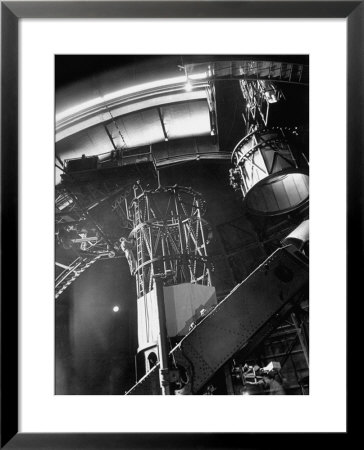 Night Assistant Climbing Down Side Of 100-Inch Telescope At Mount Wilson Observatory by Margaret Bourke-White Pricing Limited Edition Print image