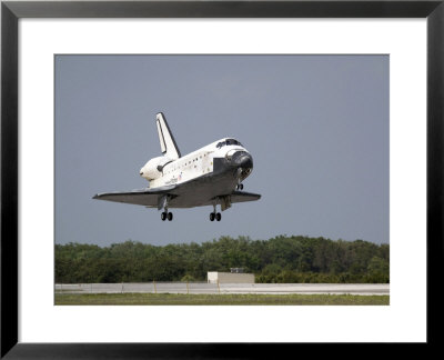 Space Shuttle Discovery Approaches Landing On The Runway At The Kennedy Space Center by Stocktrek Images Pricing Limited Edition Print image