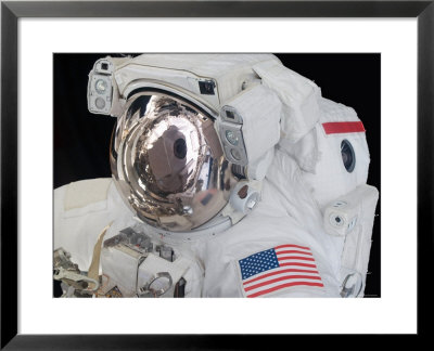 Close-Up View Of An Astronaut's Helmet Visor by Stocktrek Images Pricing Limited Edition Print image