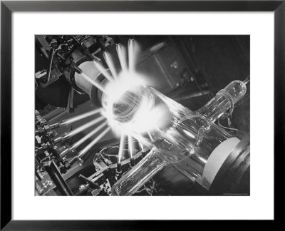Laboratory Scene Of Oxygen Hydrogen Flames Heating A Long Glass Tube To 900 Degrees Centigrade by Andreas Feininger Pricing Limited Edition Print image