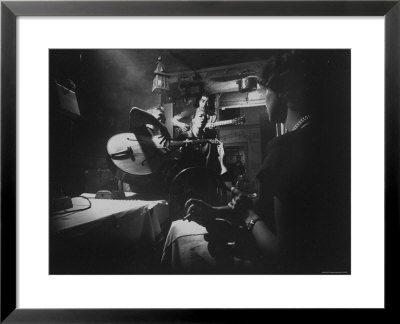 Two Guitarists And Vocalist Entertaining At Club Chez Genevieve by Gjon Mili Pricing Limited Edition Print image