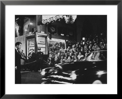Crowd Watching From Bleacher Seats Set Up On The Right Side Of Entrance To The Rko Pantages Theatre by Ed Clark Pricing Limited Edition Print image