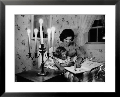 Wife Of Senator Jackie Kennedy Reading Book To Her Daughter Caroline In Family's Summer Home by Alfred Eisenstaedt Pricing Limited Edition Print image