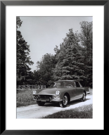 Frontal View Of A Ferrari-Pininfarina Automobile Parked On A Street In A Park by A. Villani Pricing Limited Edition Print image