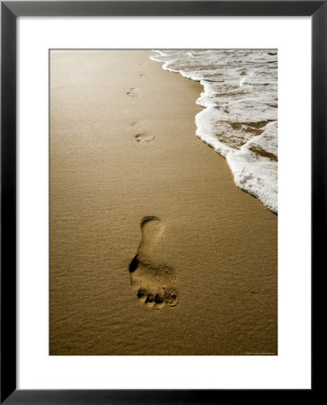 Waves About To Wash Over Footprints In The Sand, Anaho Bay, French Polynesia by Tim Laman Pricing Limited Edition Print image