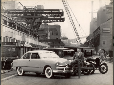 Henry Ford Ii Posing At Ford Plant With Newest Model Ford Car by Gjon Mili Pricing Limited Edition Print image