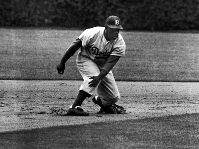 Baseball Player Jackie Robinson In Dodger Uniform Preparing To Run Bases by John Dominis Pricing Limited Edition Print image