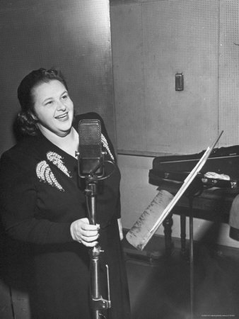 Popular Singer Kate Smith Singing A Song In A Recording Studio by Martha Holmes Pricing Limited Edition Print image