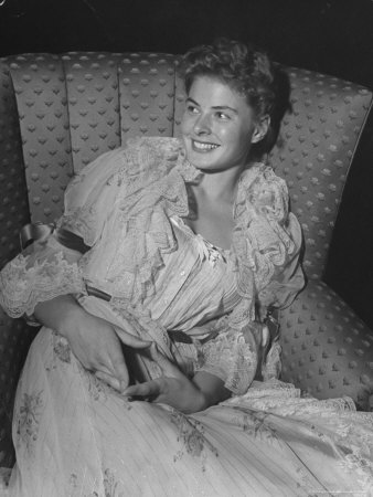 Swedish Movie Actress Ingrid Bergman In Costume, Relaxing In Easy Chair by Peter Stackpole Pricing Limited Edition Print image