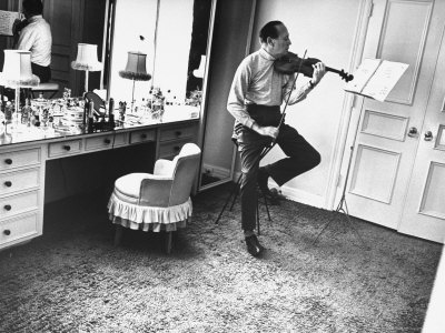 Comedian Jack Benny Seriously Practicing The Violin by Leonard Mccombe Pricing Limited Edition Print image