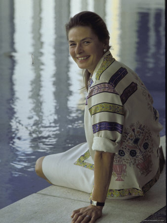 Ingrid Bergman Resting By The Pool Outside The Front Of The Ahmanson Theatre by Bill Ray Pricing Limited Edition Print image