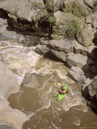 Kayaker Running 57 Chevy, Colorado, Usa by Mike Tittel Pricing Limited Edition Print image