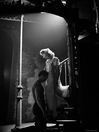 Actor Marlon Brando Kneeling Before Actress Kim Hunter In Love Scene, A Streetcar Named Desire by Eliot Elisofon Pricing Limited Edition Print image