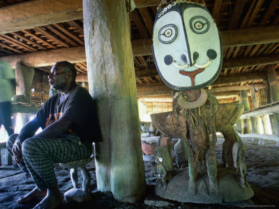 Village Chief Sitting In Spirit House (Haus Tambaran), Yentchen, East Sepik, Papua New Guinea by Jerry Galea Pricing Limited Edition Print image
