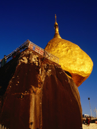 Kyaiktiyo Pagoda, A 2,500 Year Old Temple Covered In Gold Leaf, Known As Golden Rock - Myanmar by Juliet Coombe Pricing Limited Edition Print image