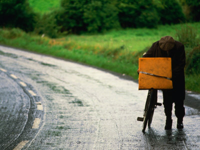 A Lone Traveller And His Bicycle, Ireland by Jon Davison Pricing Limited Edition Print image