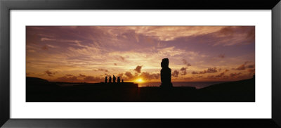 Silhouette Of Moai Statues At Dusk, Tahai Archaeological Site, Rano Raraku, Easter Island, Chile by Panoramic Images Pricing Limited Edition Print image