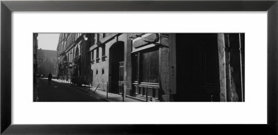Person Walking On A Street, Bilbao, Spain by Panoramic Images Pricing Limited Edition Print image