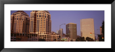 Buildings Lit Up At Night, New City Center, Alameda County, Oakland, California, Usa by Panoramic Images Pricing Limited Edition Print image