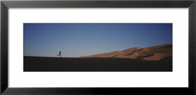 Runner Jogging In The Park, Great Sand Dunes National Monument, Colorado, Usa by Panoramic Images Pricing Limited Edition Print image