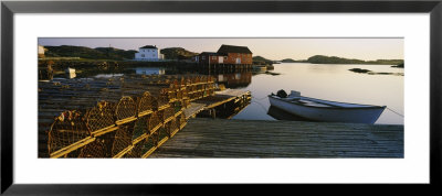Stack Of Lobster Traps At A Dock, Change Islands, Newfoundland And Labrador, Canada by Panoramic Images Pricing Limited Edition Print image