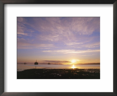 Udale Bay And Oil Rigs At Dawn, Ross-Shire by Iain Sarjeant Pricing Limited Edition Print image