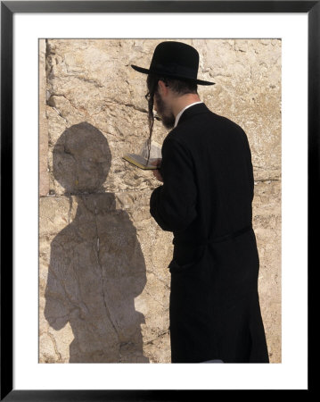 Jewish Man Prays At The Western Wall During Passover In Jerusalem, Israel by Richard Nowitz Pricing Limited Edition Print image